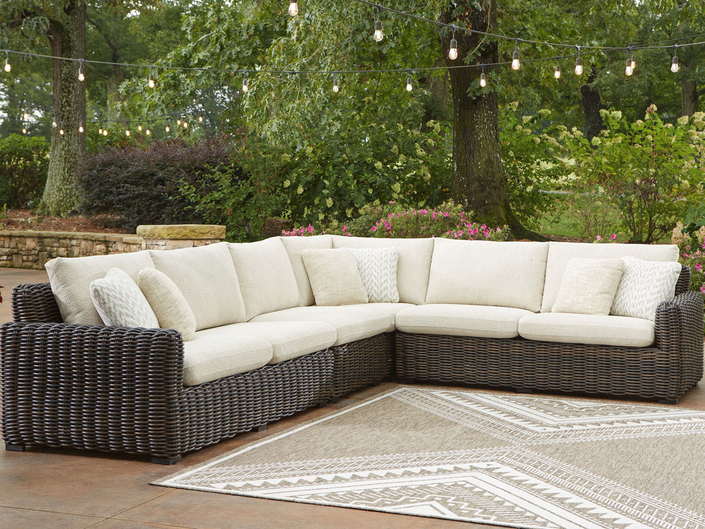 Kimora - 7 Pc. - 4-Piece Outdoor Sectional, Swivel Glider Lounge, Cocktail Table, End Table - Beige / Dark Brown - Roberts Furniture & Mattress (Yorktown, VA)