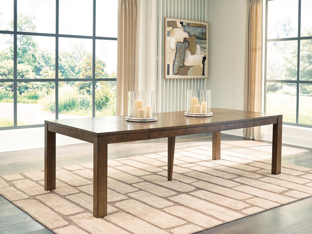 Marxmore - Rectangular Dining Room Butterfly Extension Table - Brown - Roberts Furniture & Mattress (Yorktown, VA)