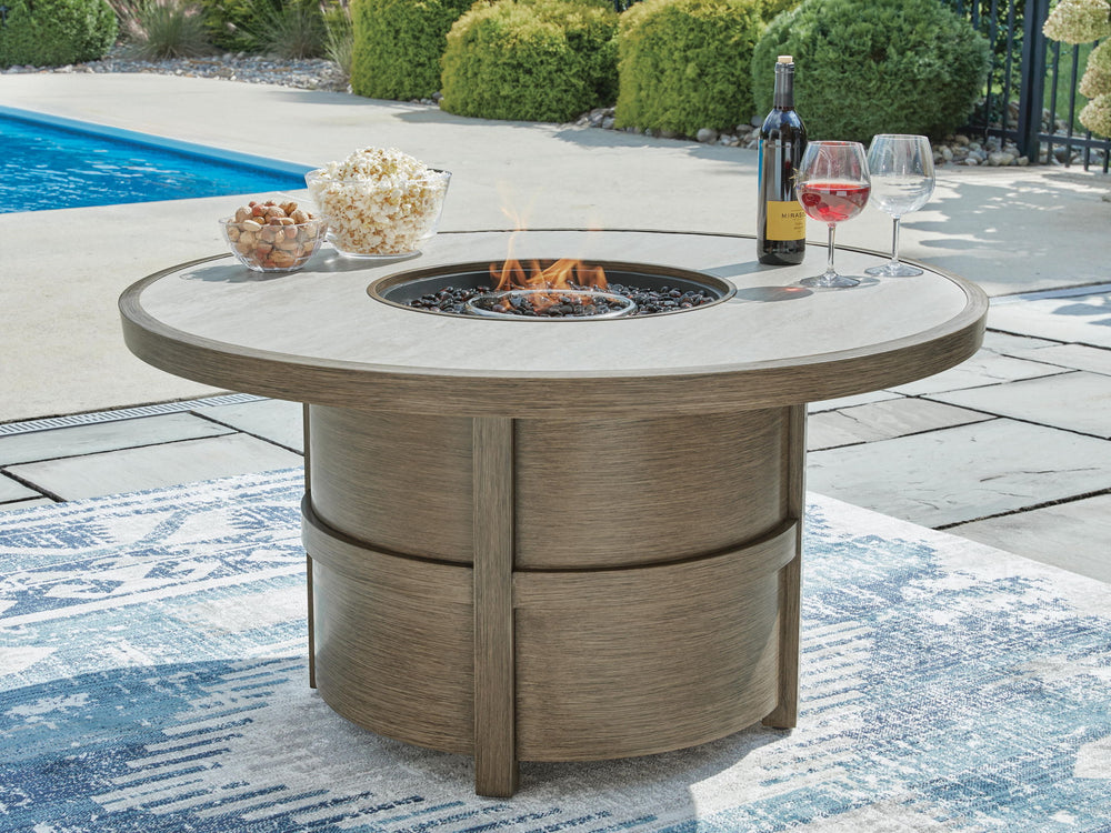 Rainier Ranch - Round Fire Pit Table - Beige - Roberts Furniture & Mattress (Yorktown, VA)