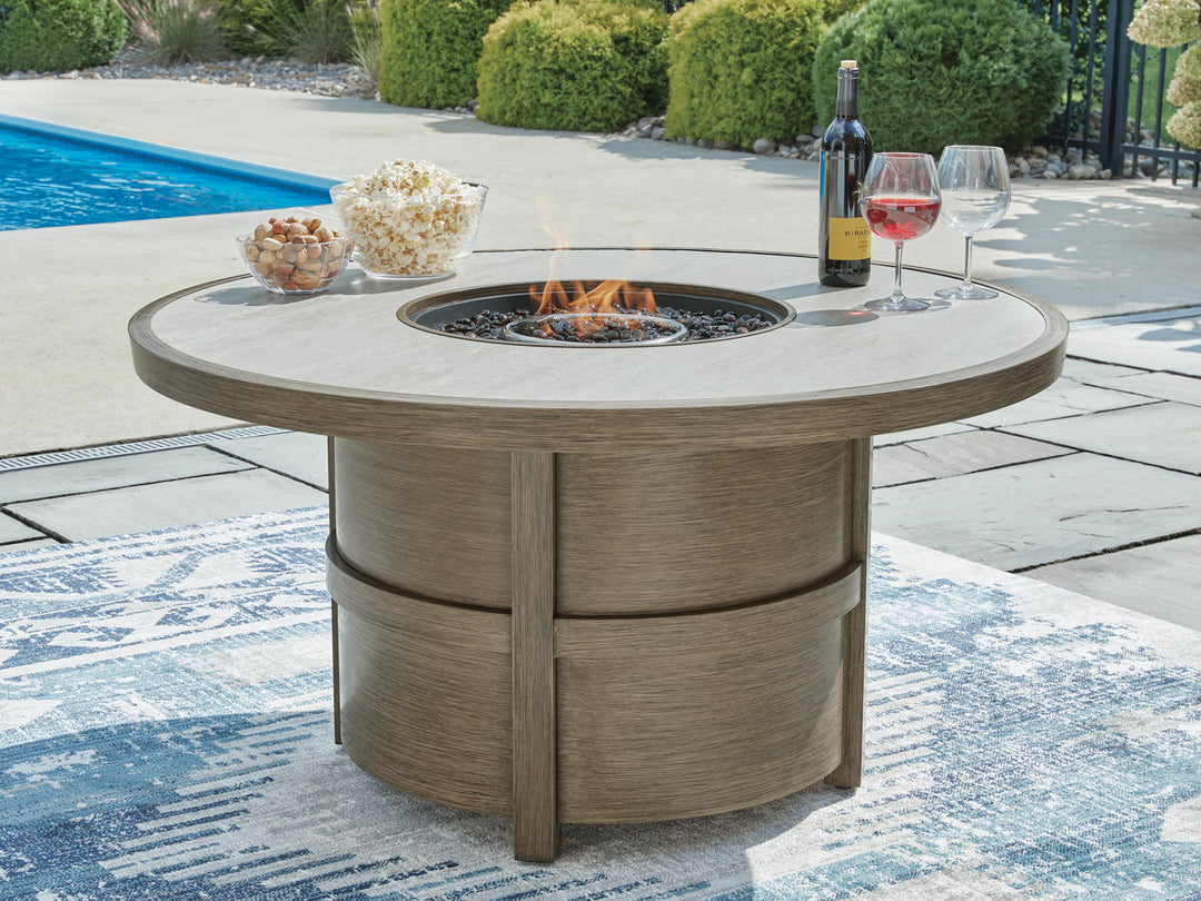 Rainier Ranch - Round Fire Pit Table - Beige - Roberts Furniture & Mattress (Yorktown, VA)