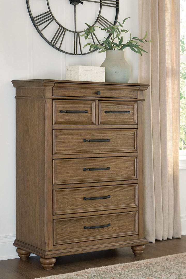 Karallin - Seven Drawer Chest - Medium Brown - Roberts Furniture & Mattress (Yorktown, VA)